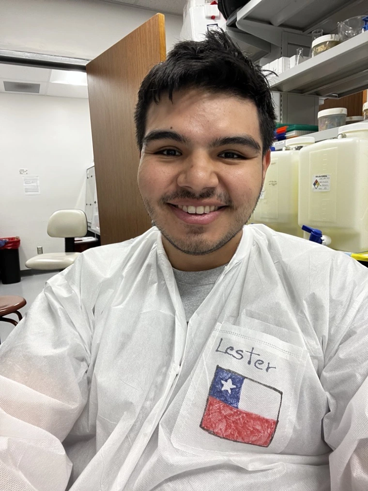 Lester Berrios Cortes in a lab coat.