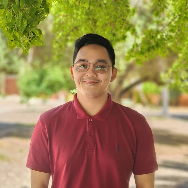 Image of Jarvin Nipales in front of some trees